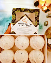 Load image into Gallery viewer, Nubian Heritage: Abyssinian Oil &amp; Chia Seed Bath Bombs (Set of 6)
